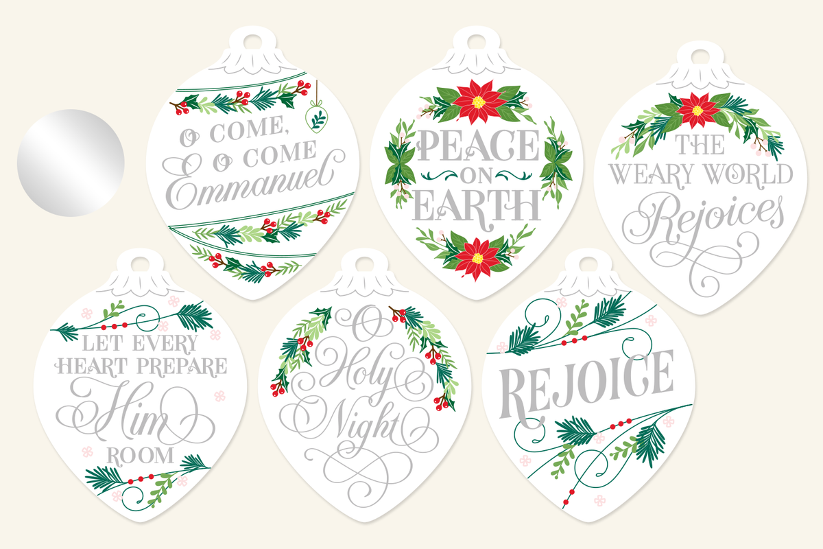 Silver foliage Christmas ornaments with hand-lettered carol lyrics